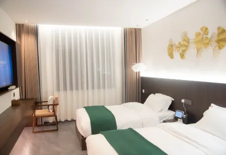 Tongxing Tea House Hotel, Mengla Отели в г. Менла