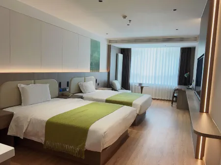 Xinlong Holiday Business Hotel(Qingdao Shandong University of Science and Technology Store) Отели рядом с достопримечательностью «Shandong University of Science and Technology (Qingdao Campus)»