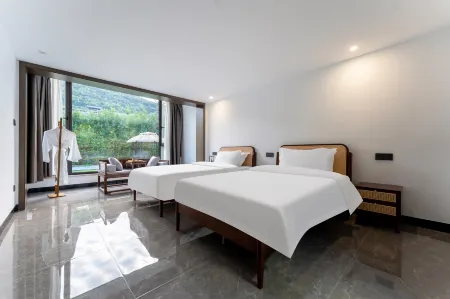 Floral Hotel · Woshou Mountain Hotel Отели рядом с достопримечательностью «Yuanxiangxiaozhen Sceneic Area»