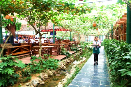 Qingqing Inn Отели рядом с достопримечательностью «Taiji Wuse Valley»