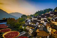 Wuyuan Lanbo M Hotel (Railway Station) - غرفة مطلة على الجبل