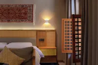 Kucha Bieyuan Homestay - Airport Shuttle