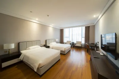 Nan'an Yuanchang Business Hotel Отели рядом с достопримечательностью «Пассажирская станция Лодон»