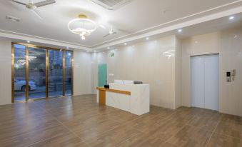 Aiqin Business Apartment (Shenzhen Longgang Liyuan Subway Station)