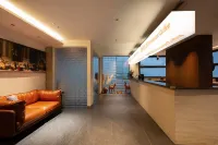 Floral Hotel · Guanhe Wild Charm Hotel - bar