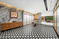 Grand Rezen Hotel Zhaosu  (Tianma International Tourism Cultural Plaza Jiefang Street) - فطور