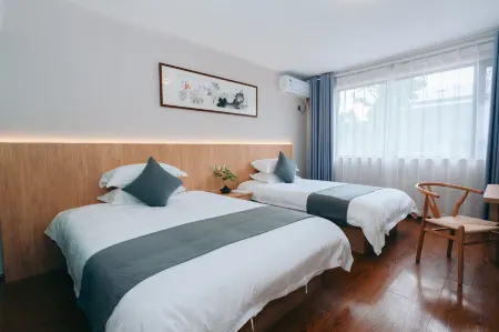 Xiandu Huayixiao Homestay Отели рядом с достопримечательностью «Zhutan Mountain»