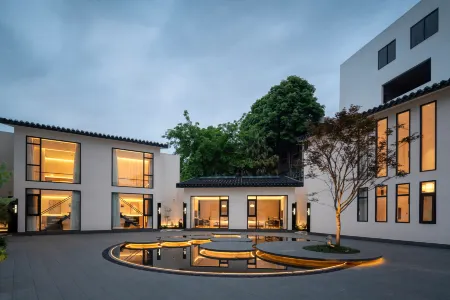 Dayi Puyue Liangshe Hotel Отели в г. Даи