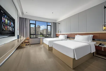 Dazu Dongnavis Hotel (Wuyue Plaza, Southwest China) Отели рядом с достопримечательностью «Dazu Stone Carving Baoding Mountain Scenic Area - Guiding Service Hall»