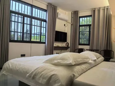 Guanlian Homestay Hoteles cerca de Jiulonghu