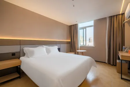 From · Y Translation Heju Hotel (Puhang Road Subway Station Branch) Отели рядом с достопримечательностью «Auxiliary Wharf of Shuitou International Rock City»