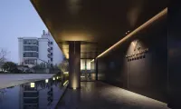 VEEGLE BY LANDISON HOTEL Отели рядом с достопримечательностью «Международный торговый город»