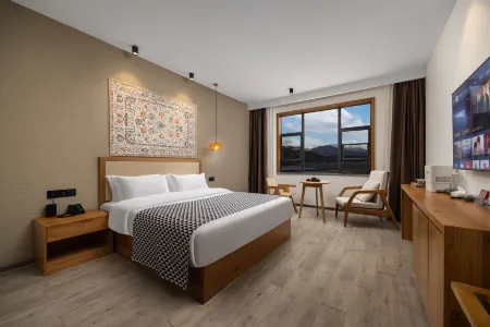 Ozz·nice·HESU·hotel Отели рядом с достопримечательностью «Huanglongshan Yuanshi Forest Sceneic Area»