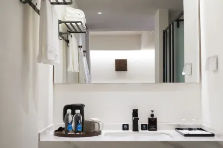 Four Seasons Hot Spring Private Soup Resort Hotel Отели рядом с достопримечательностью «Moxi Ancient Town»