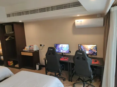 Jingzu E-sports Hotel (Luzhou High-Speed Rail Station Southwest Trade City Branch)