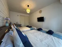 Nestay apartment Tokyo Shinjuku Отели рядом с достопримечательностью «Спа-комплекс Ruby Palace»