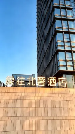 E · Bether Hotel