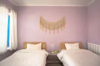 Zhaosu Biancheng Youth Hostel - ที่มีที่จอดรถ