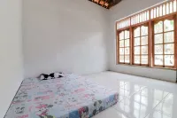 Griya Erlangga Homestay Hotel a Pajangan