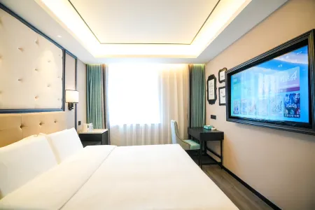 West Bank Hotel (Longjing West Market) Отели рядом с достопримечательностью «Longshan Korean Folk Village»