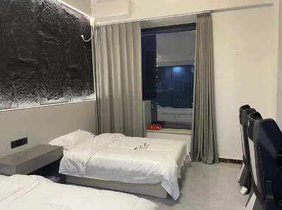 Yuwo E-sports Hotel (Pingdingshan Hengyu Dongcheng International Store) Hotellit kohteessa Weidong District