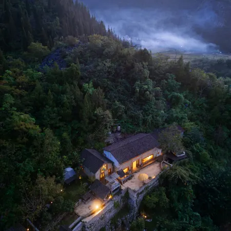 Guanwang Guesthouse Отели в г. Синъи