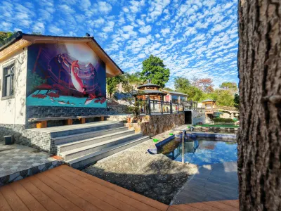 龍巖客天下温泉山莊 鄰近永定區金豐溪東洋溪安全生態水系建設項目部的酒店