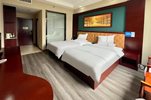 Xinhua Hotel (Wenshan Qihua Plaza)