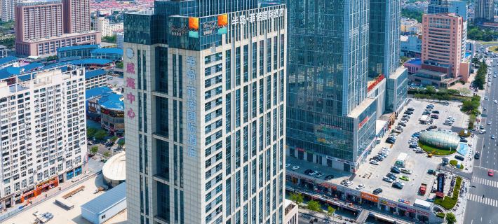 Peninsula Fino International Hotel Отели в г. Вэйхай