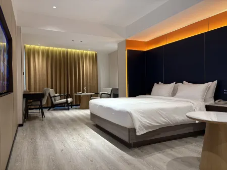 Jiu Ding Joy Hotel Отели рядом с достопримечательностью «City Motorbike»