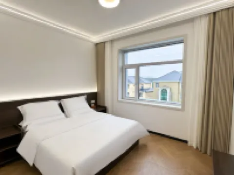 Qimu Homestay Hotel