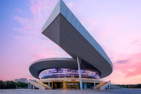 Jinyi Optimal Selection Hotel (Baotou Olympic Park Branch) Отели рядом с достопримечательностью «Yinhe Square»