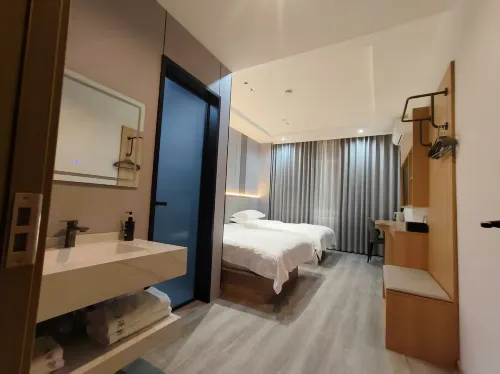 Huan Yunmange Hotel - 2 Yıldız