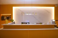 Minle Qiyue Hotel - parking