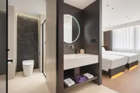 Yun Nan She Holiday Hotel (Qiqiqiao Shiqiao Market Branch, Jinzhou Railway Station) - Ramah keluarga