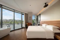 Wuyuan Lanbo M Hotel (Railway Station) - غرفة مطلة على الجبل