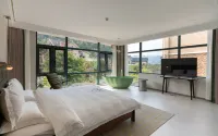 Zhimo Homestay (Wanfeng Linfenglin Huajing Branch) Hotels in Xingyi