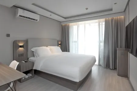 Kamoor Collection Hotel (Hangzhou Bay Century City) Отели рядом с достопримечательностью «Ningbo Engineering College»