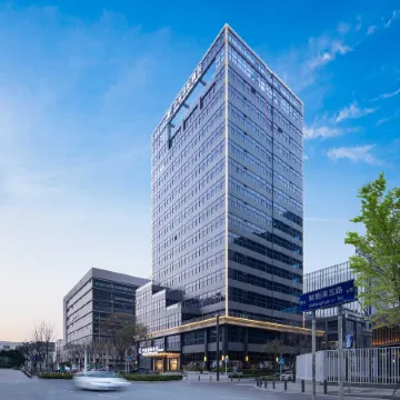 Shenzhen Zhongchen International Hotel (Baolong Subway Station Pingshan high-speed railway station) Отели рядом с достопримечательностью «Biadi Share Co. ООО.»