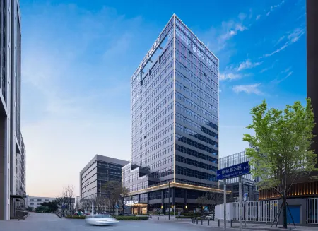 Shenzhen Zhongchen International Hotel (Baolong Subway Station Pingshan high-speed railway station) Отели рядом с достопримечательностью «Baoneng All City Shopping Center Longgang Branch (Jianshe Road)»