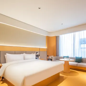 Ximan Hotel (Shanzhou District Government Wucaicheng Shopping Center)