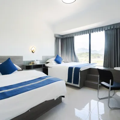 Tianzhi Blue Homestay (Zhangjiajie West Station) โรงแรมใกล้สถานีรถไฟตะวันตกจางเจียเจี้ย