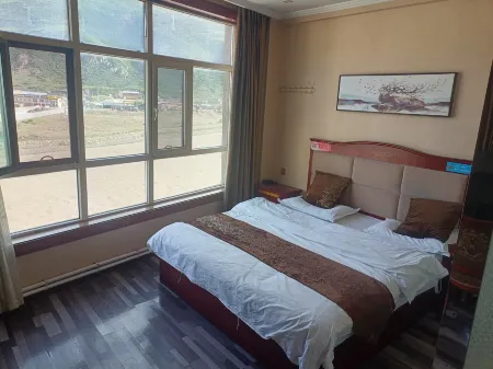 Zadoi Xueshan Business Hotel Отели в г. Цзадо