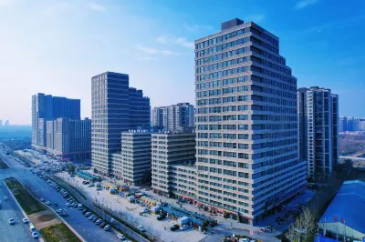 Qixing Lizhi Hotel (Jinshuiyuan Happy Valley, Henan Light Industry Vocational College) Hotel in zona Zhengyao Long-distance Bus Station
