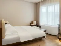 Litang Huaxi Yungu Hotel (Ririjia Village)
