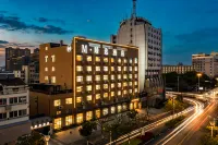 M·Hotel·Zhenxuan Hotel di 