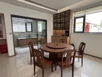 Weishan Evening Shore Cottage Inn - فطور