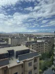 Yuandong Hualun Hotel - Mountain view