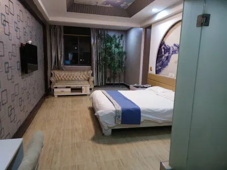 Huayi E-sports Hotel (Fengxian Bus Station) Отели в г. Фэнсянь