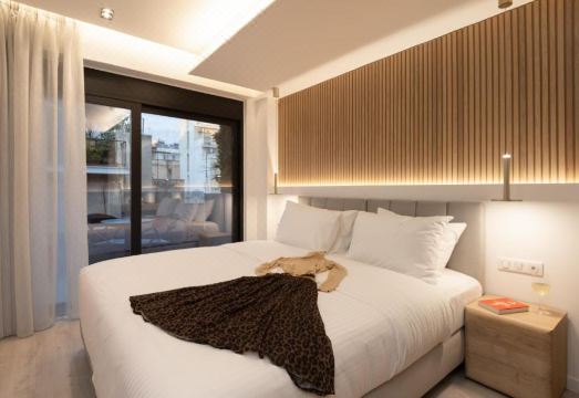 인칸토 부티크 스위트의 모던한 객실 내부 사진